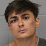 Ethan Blaine Nieneker, o homem que é acusado de abrir fogo fora de um gol no Texas, matou três pessoas, foi retratado pela primeira vez em sua caneca parece espancado e azul -marcado