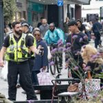 O centro da cidade de Derby viu um aumento nos policiais que patrulham a área após o recente assassinato de um empresário em um banco e um assalto de bronze, ambos em plena luz do dia