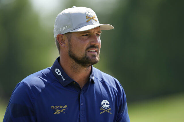 Byson Dechambau, de Byson Sidelines Golf Use da Ryder Cup Wating

