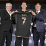 Seu filho Heung-min da Coréia do Sul foi apresentado como um novo membro do Los Angeles FC em uma conferência de imprensa para o time de futebol da MLS em Los Angeles.