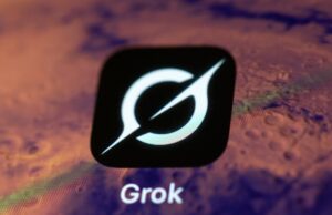 Os governos lutam contra a enxurrada de nudez não consensual no X The Grok app on a smartphone