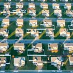 An oblique aerial view of suburban houses.