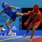 Arquivo - Carlos Baylon Jr (à esquerda) durante o concurso Wushu Sanda de 2025 Jogos Mundiais. -