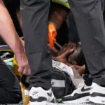 Morice Norris, do Lions, compartilha boas notícias de manhã depois de serem removidas do campo na ambulância