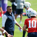 O Patriot ajustou os anúncios como execução duma hipoteca no backfield