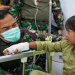 O TNI trouxe um helicóptero dentro de Papu