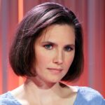 Amanda Knox sendo escoltada para sua audiência de apelação em 29 de setembro de 2011 em Perugia, Itália.