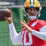 Packers, QB, gostaria de ter deixado o procedimento de polegar