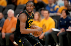 Rumores de agências livres da NBA: Jonathan Kuminga enigma dos Warriors, Kings aprofunda 63 milhões de dólares de 77.975.308 guardas como um acordo de US $ 63 milhões March Madness Logo