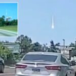 Um objeto brilhante no céu na estrada.