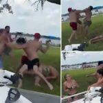 Uma luta diária selvagem explode entre os marinheiros vestidos com um maiô no lago da Flórida em frente a famílias, crianças: vídeo