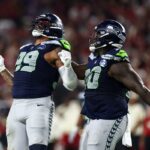 Leonard Williams #99 of the Seattle Seahawks celebrates after a sack during an NFL football game against the Arizona Cardinals.