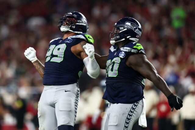 Leonard Williams #99 of the Seattle Seahawks celebrates after a sack during an NFL football game against the Arizona Cardinals.