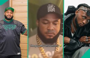 A expressão facial de Sam Larry enquanto ele olha para o Skitmaker, o Paper Chaze, no Clube provoca comentários A expressão facial de Sam Larry enquanto ele olha para o Skitmaker, o Paper Chaze, no Clube provoca comentários