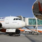 Kam Air Planes sendo abordados por passageiros no Aeroporto Internacional de Kabul.