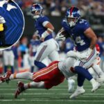 Cam Skattebo corre com a bola durante o jogo Giants-Chiefs em 21 de setembro de 2025.