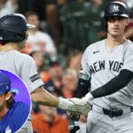 Austin Wells (28) comemora com Cody Bellinger (35) depois de marcar uma corrida durante o sétimo turno da vitória por 7-0 dos Yankees sobre os Orioles em 18 de setembro de 2025.