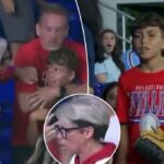 Fan de Phillies irritado bateu por arrebatar a bola de home run de garoto depois que ela perseguiu o pai dele