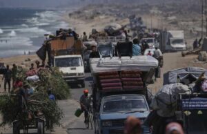 Israel ordena evacuação completa da cidade de Gaza Os palestinos deslocados que fogem de Gaza do norte carregam seus pertences ao longo da estrada costeira em direção ao sul de Gaza, terça -feira, 9 de setembro de 2025, depois que o Exército israelense emitiu ordens de evacuação da cidade de Gaza. (AP Photo/Jehad Alshrafi)