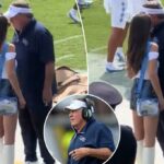 Jordon Hudson conversa com Bill Belichick na lateral antes da feia perda da Carolina do Norte para a UCF