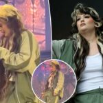 Lola Young fala depois de desmoronar no palco durante a apresentação do festival