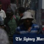 Os palestinos deslocados fogem da cidade de Gaza ao longo da estrada costeira em direção ao sul de Gaza na quarta -feira.