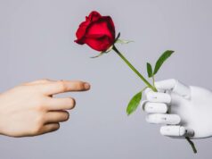 O CEO da Hinge deixa o cargo para lançar o Overtone, um aplicativo de namoro com IA human hand reaching for red rose in robotic hand