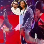 O ex -Kayla Nicole de Travis Kelce recebe dança sensual de Chris Brown no palco durante o show