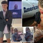 O jovem sangrento e ferido sentado no chão.
