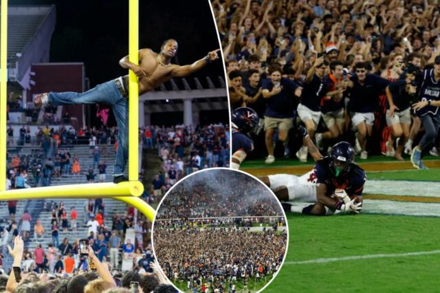 Os torcedores da Virginia Storm Field depois da vitória chateada sobre o estado da Flórida na cena do futebol universitário fofo

