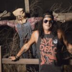 Reduzir, as armas n 'Roses Tale, podem falar sobre suas experiências de parque de diversões favorecidas ao longo do dia