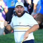 FARMINGDALE, NEW YORK - SEPTEMBER 28: Shane Lowry of Europe celebrates holing a putt on the 18th green to retain the Ryder Cup during the Sunday singles matches of the 2025 Ryder Cup at Black Course at Bethpage State Park Golf Course on September 28, 2025 in Farmingdale, New York.