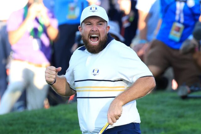FARMINGDALE, NEW YORK - SEPTEMBER 28: Shane Lowry of Europe celebrates holing a putt on the 18th green to retain the Ryder Cup during the Sunday singles matches of the 2025 Ryder Cup at Black Course at Bethpage State Park Golf Course on September 28, 2025 in Farmingdale, New York.