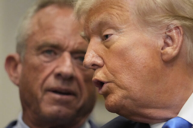 President Donald Trump and Centers for Medicare & Medicaid Services administrator Dr. Mehmet Oz listen as Health and Human Services Secretary Robert F. Kennedy Jr. speaks in the Roosevelt Room of the White House, Monday, Sept. 22, 2025, in Washington. (AP Photo/Mark Schiefelbein)