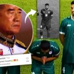 Só sujeito a Allah! O jogador da equipe nacional iraquiana Aymen Hussein se levanta em frente ao oficial do Reino da Tailândia