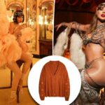 Um modelo usando o novo cardigã laranja de Taylor Swift