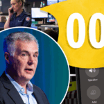 Uma placa de telefone Optus fica acima de sua loja em Sydney