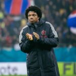 Jogador do Manchester United Tyrell Malacia em ação para PSV.