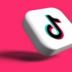 Aquisição do TikTok | Logotipo 3D em fundo colorido