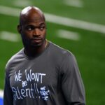 Adrian Peterson usando um
