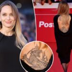 Angelina Jolie exibe suas enormes tatuagens nas costas em um vestido sem costas na estreia de 'Couture' em Roma