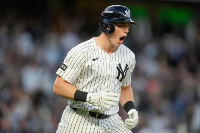 O New York Yankees Base Ben Rice reage depois de acertar um home run de duas corridas contra o Boston Red Sox durante o primeiro turno do jogo 2 de uma série de playoffs de beisebol da American League Wild Wild Wildball, quarta-feira, 1 de outubro de 2025, em Nova York.