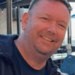 Chris Robertson foi identificado como o homem de 49 anos encontrado morto em uma oficina na praia de O'Sullivan em Lonsdale, um subúrbio industrial em Adelaide, ontem.