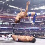 Kota Ibushi executes a flip in the center of the ring during the Men's Casino Gauntlet Match at AEW All In Texas. (Ricky Havlik/AEW)