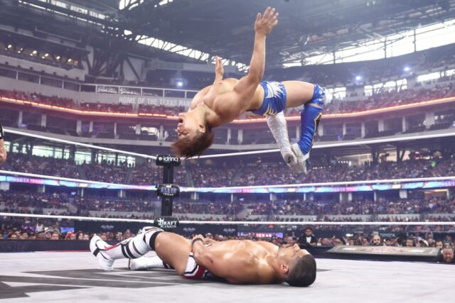 Kota Ibushi executes a flip in the center of the ring during the Men's Casino Gauntlet Match at AEW All In Texas. (Ricky Havlik/AEW)