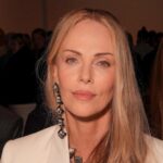 Charlize Theron e Bernard Arnault