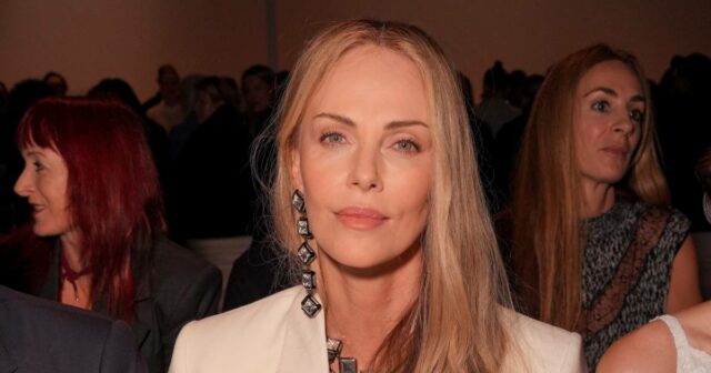Charlize Theron e Bernard Arnault