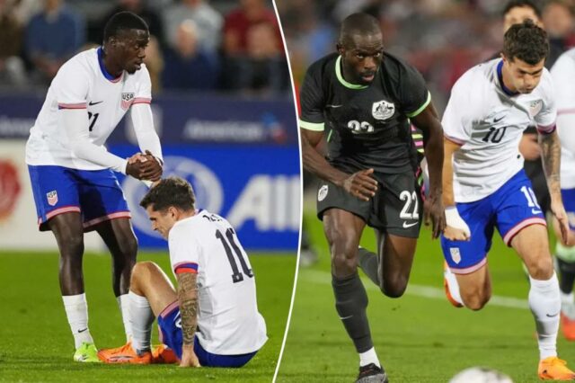 O atacante dos Estados Unidos Tim Weah, à esquerda, ajuda o atacante Christian Pulisic depois que ele se machucou contra a Austrália no primeiro tempo de um amistoso internacional de futebol na terça-feira, 14 de outubro de 2025, em Commerce City, Colorado.