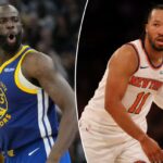 Draymond Green em seu uniforme do Golden State Warriors com a boca aberta.