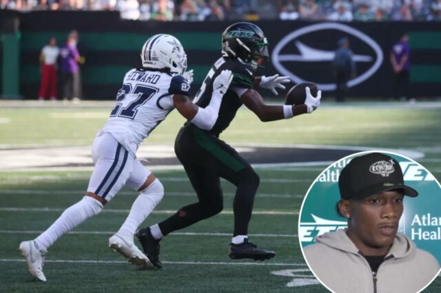 Garrett Wilson faz uma captura durante o jogo Jets-Cowboys em 5 de outubro de 2025. 
